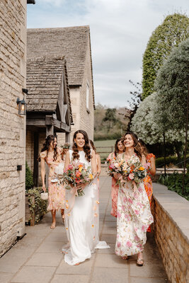 Beautiful wedding ceremony flower arrangements and bridal arch decorations at Hyde House